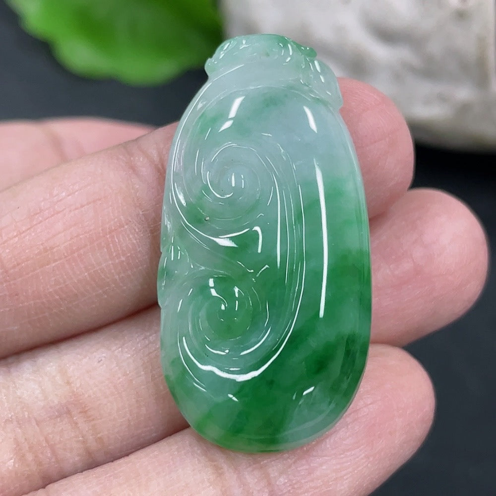 Jadeite Ruyi pendant necklace from HKHQ featuring a polished green jade Ruyi charm on a delicate chain.