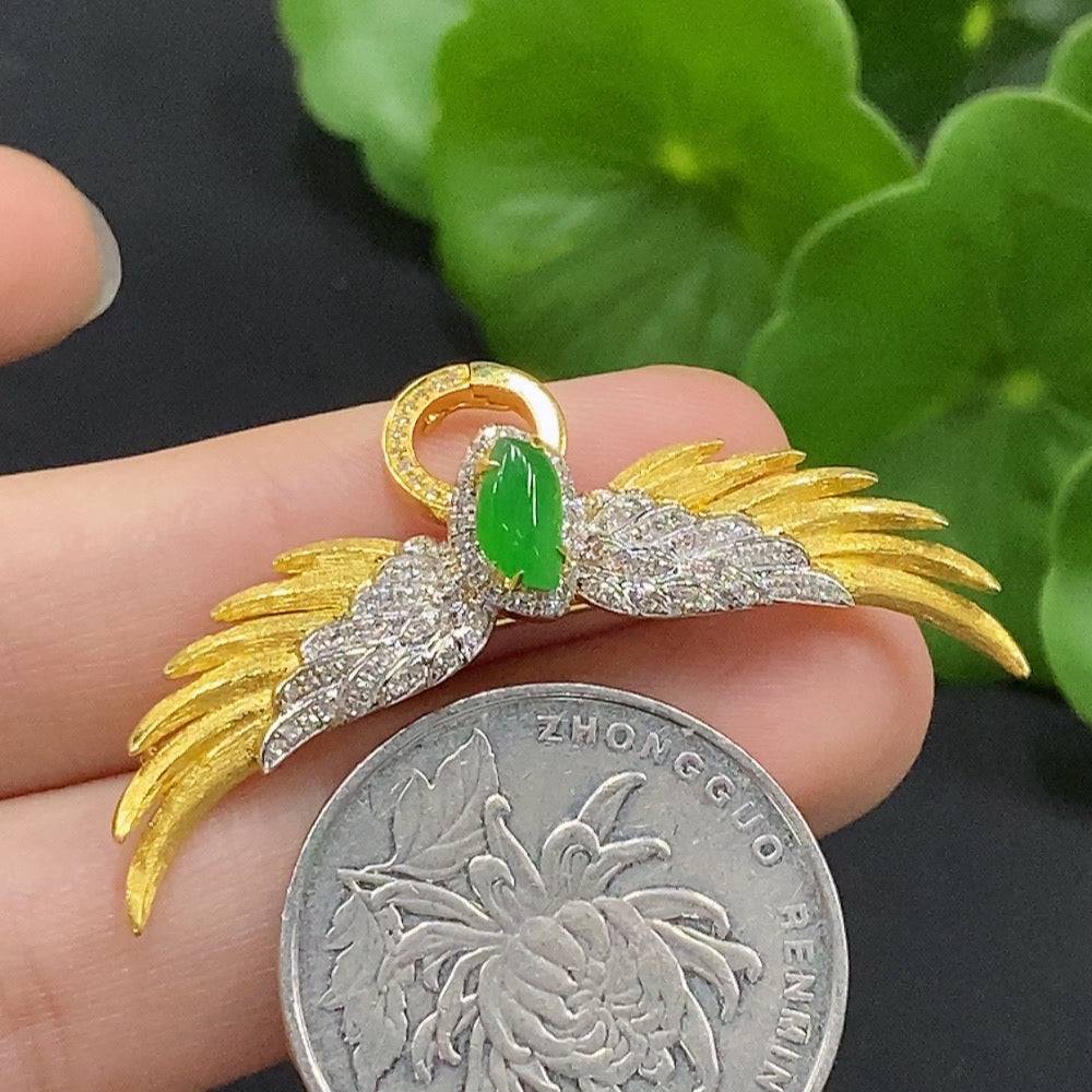 Jadeite inlaid brooch with 18K gold and diamond accents, featuring intricate craftsmanship and a polished jade surface.