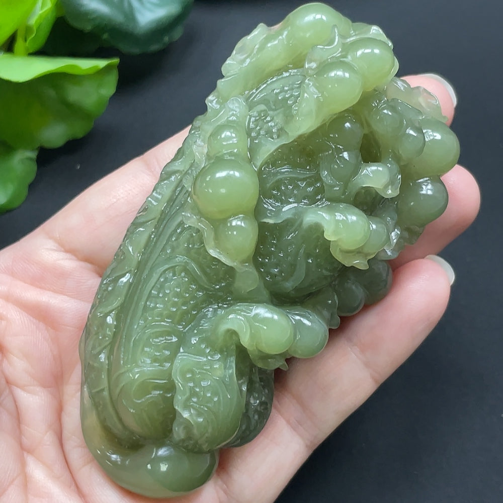 Hetian jade cabbage pendant necklace by HKHQ, featuring a detailed green jade cabochon in a natural cabbage shape.