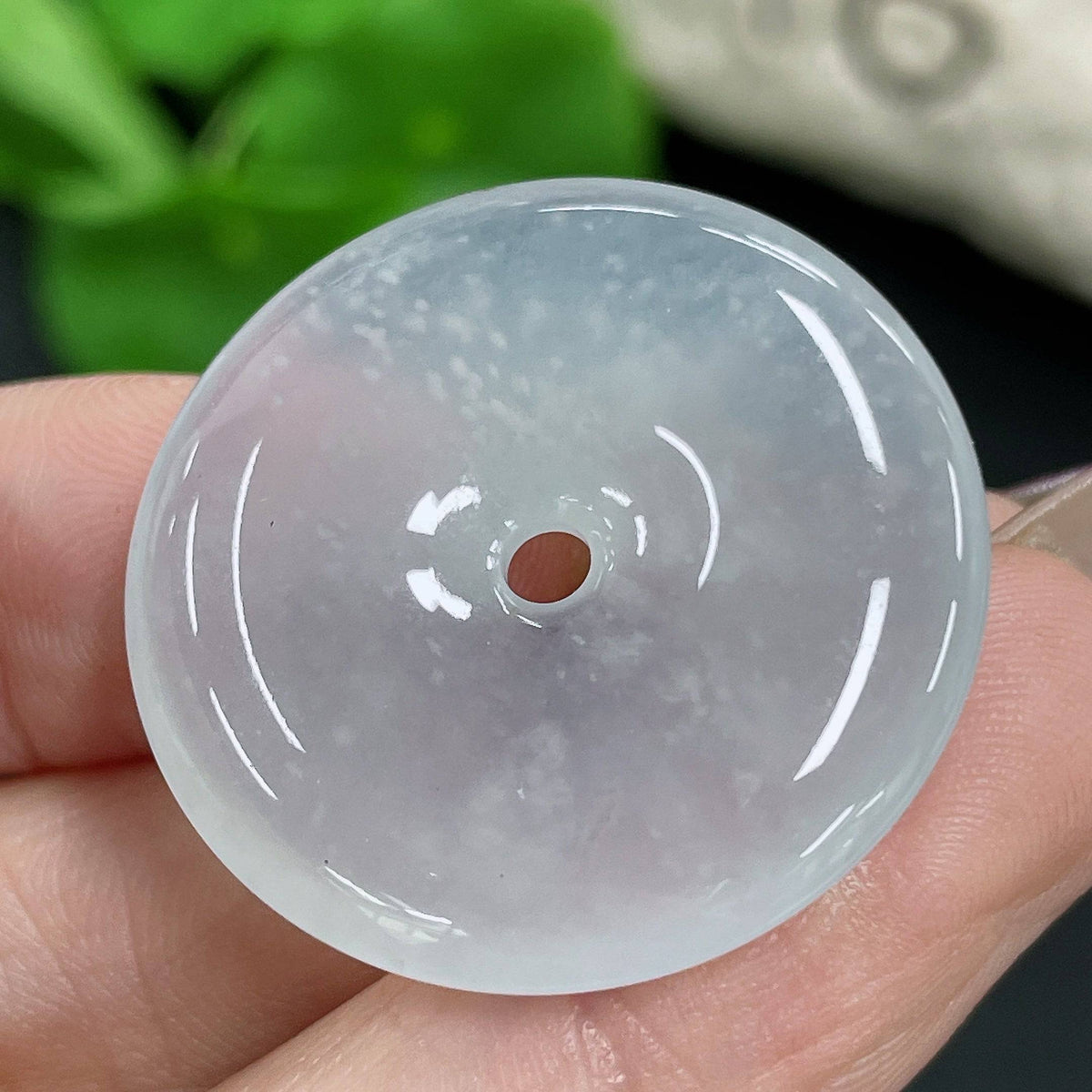 HUILIU HQ jadeite pendant with peace buckle, weighing about 10.15g, featuring smooth, polished jade in a natural green hue.