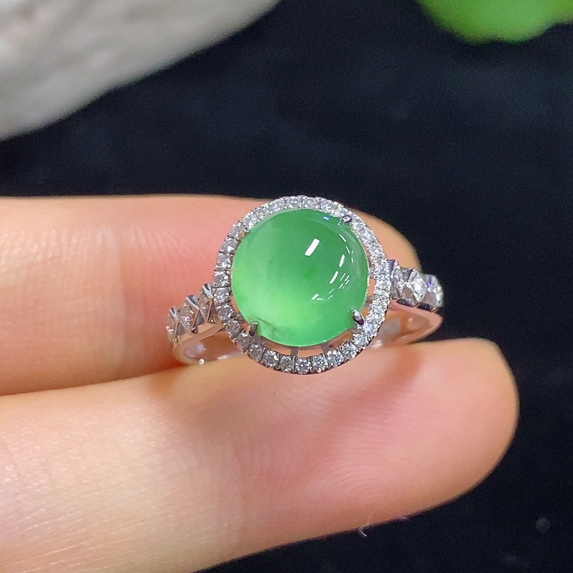 HKHQ Jadeite cabochon ring with diamond accents, 18K gold inlaid design, showcasing intricate craftsmanship and elegant style.