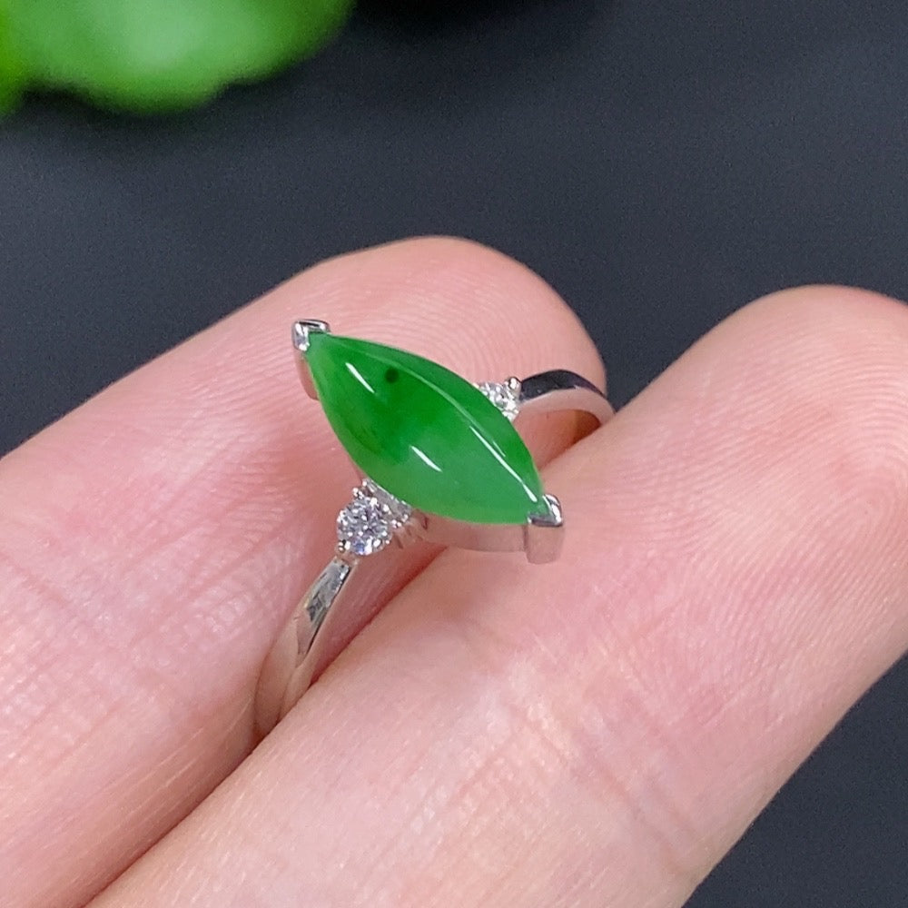Jadeite freeform ring in 18K gold with diamond accents, featuring an organic gemstone design and elegant craftsmanship.