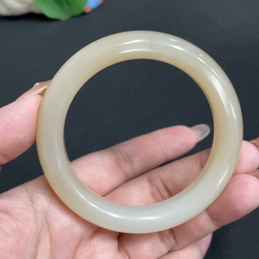 Huiliu certified Hetian jade round bracelet with digital collection certificate, showcasing smooth, polished jade beads.