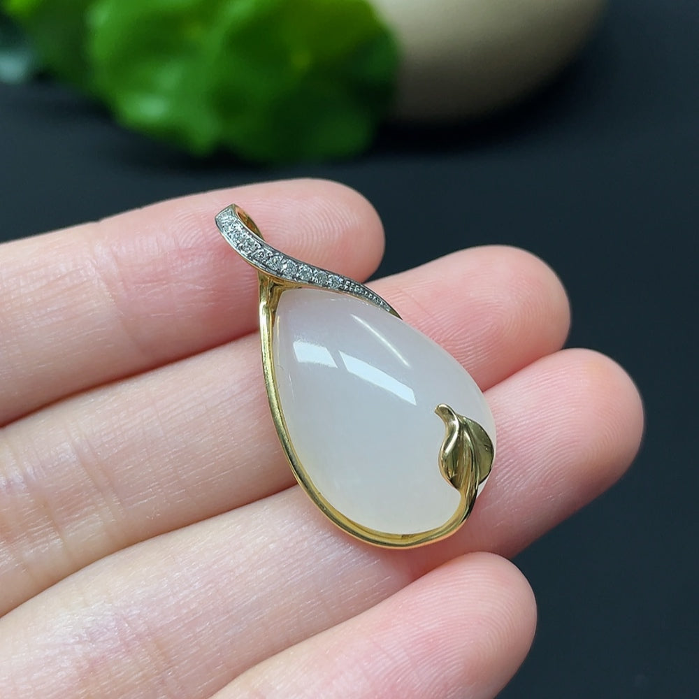Hetian jade water drop pendant necklace by HKHQ featuring 18K gold and diamond accents, showcasing elegant craftsmanship.