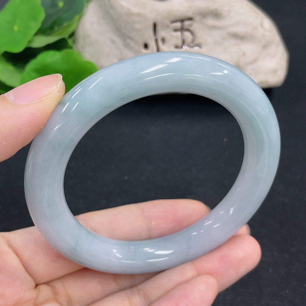 Jadeite round bangle with a smooth finish, weighing approximately 65.9g and size 57.4, crafted by HKHQ.