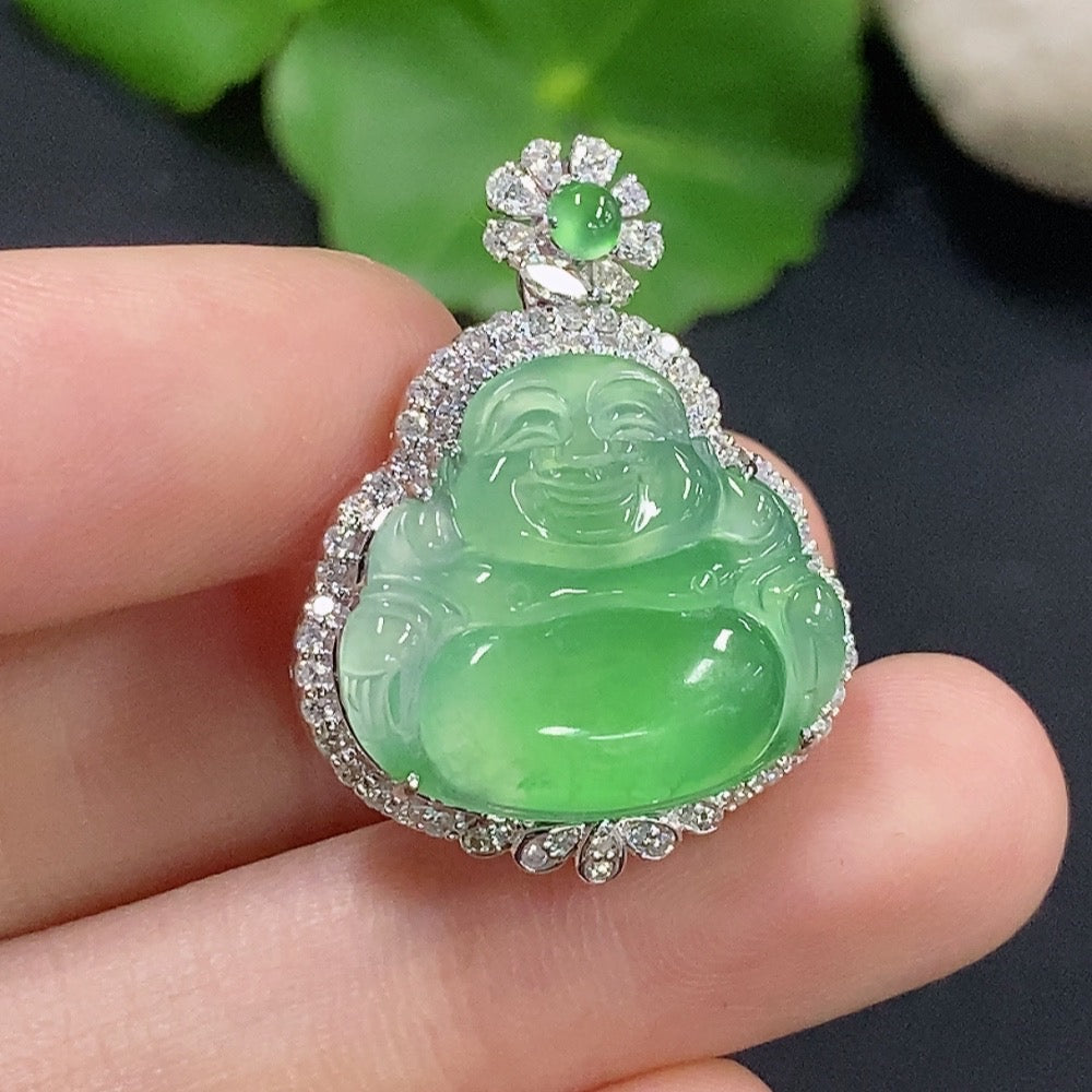 Jadeite Buddha pendant set in 18K gold with diamond accents, featuring a detailed Buddha charm on a gold necklace.