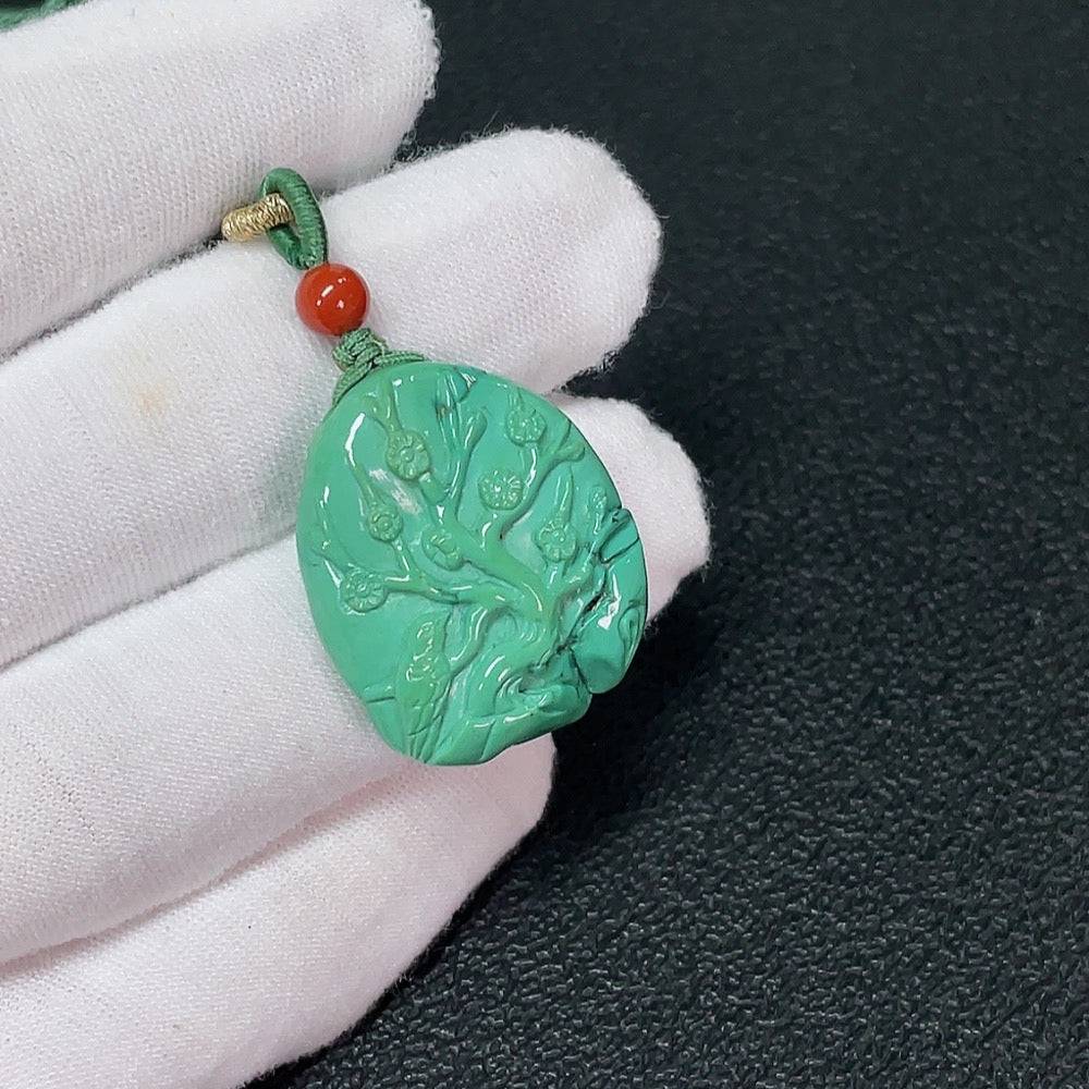 Turquoise pendant with Southern Red Agate gemstone on a rope, crafted by Huiliu, showcasing vibrant blue and red natural gemstone colors.