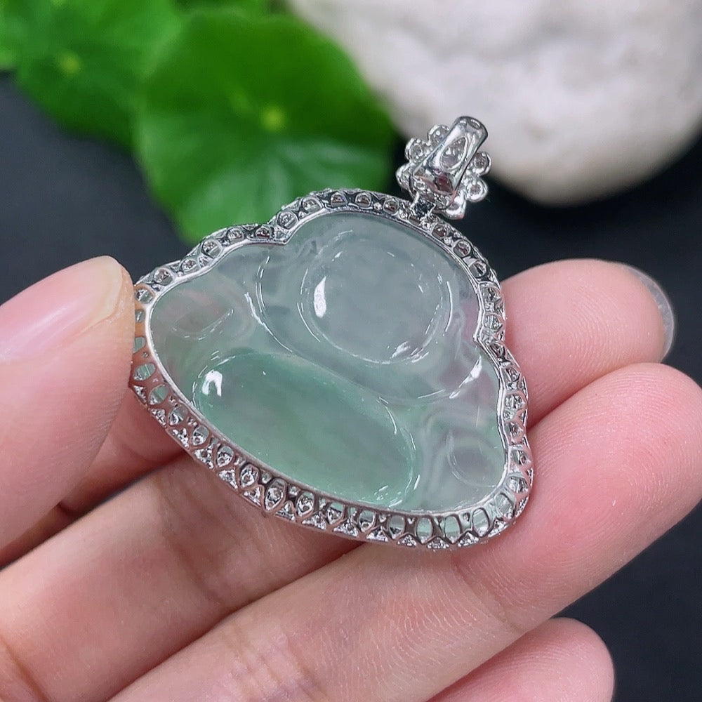 Jadeite inlaid Buddha pendant with 18K gold and diamond accents, weighing approximately 7.27g, showcasing intricate craftsmanship.