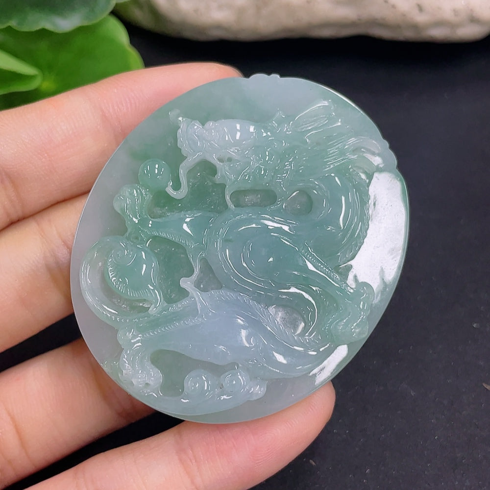 Jadeite dragon pendant necklace from HKHQ, featuring a detailed green jadeite dragon design on a silver chain.
