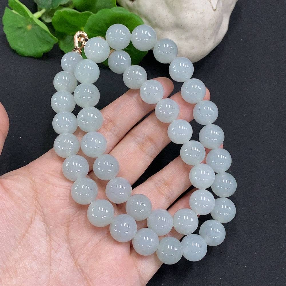 HUILIU HQ jadeite beaded necklace with 11.9mm round beads, non-gold, weighing approximately 131.5 grams, displayed close-up.