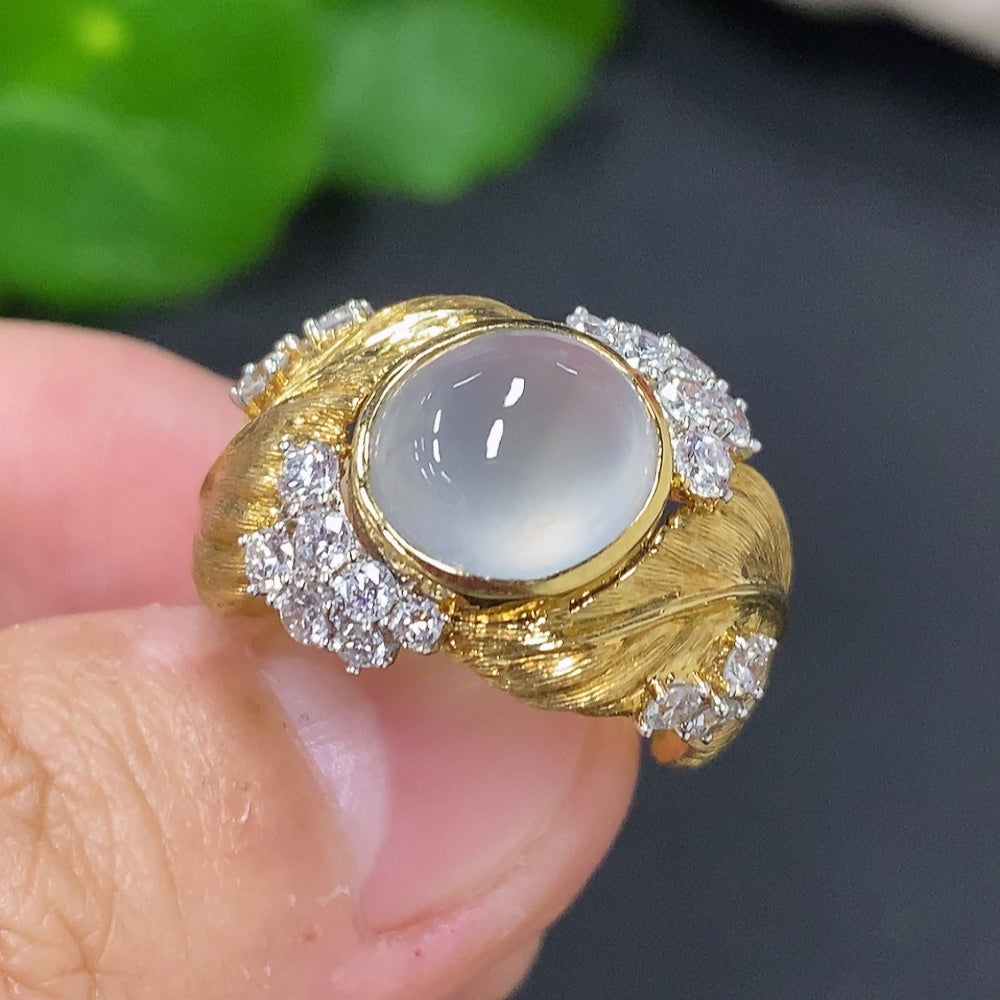 Jadeite cabochon inlaid ring with 18K gold band, size 11, weighing approx. 9.8g, featuring a smooth, polished jade gemstone.