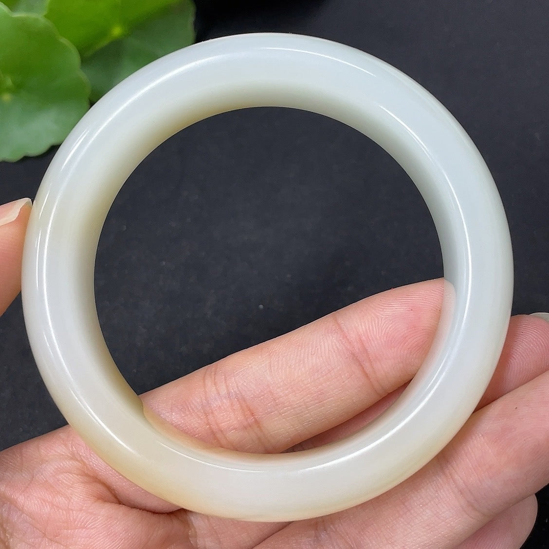 Hetian Jade round bracelet with size 54.1 and approximately 70.3g weight, featuring smooth, polished jade beads.