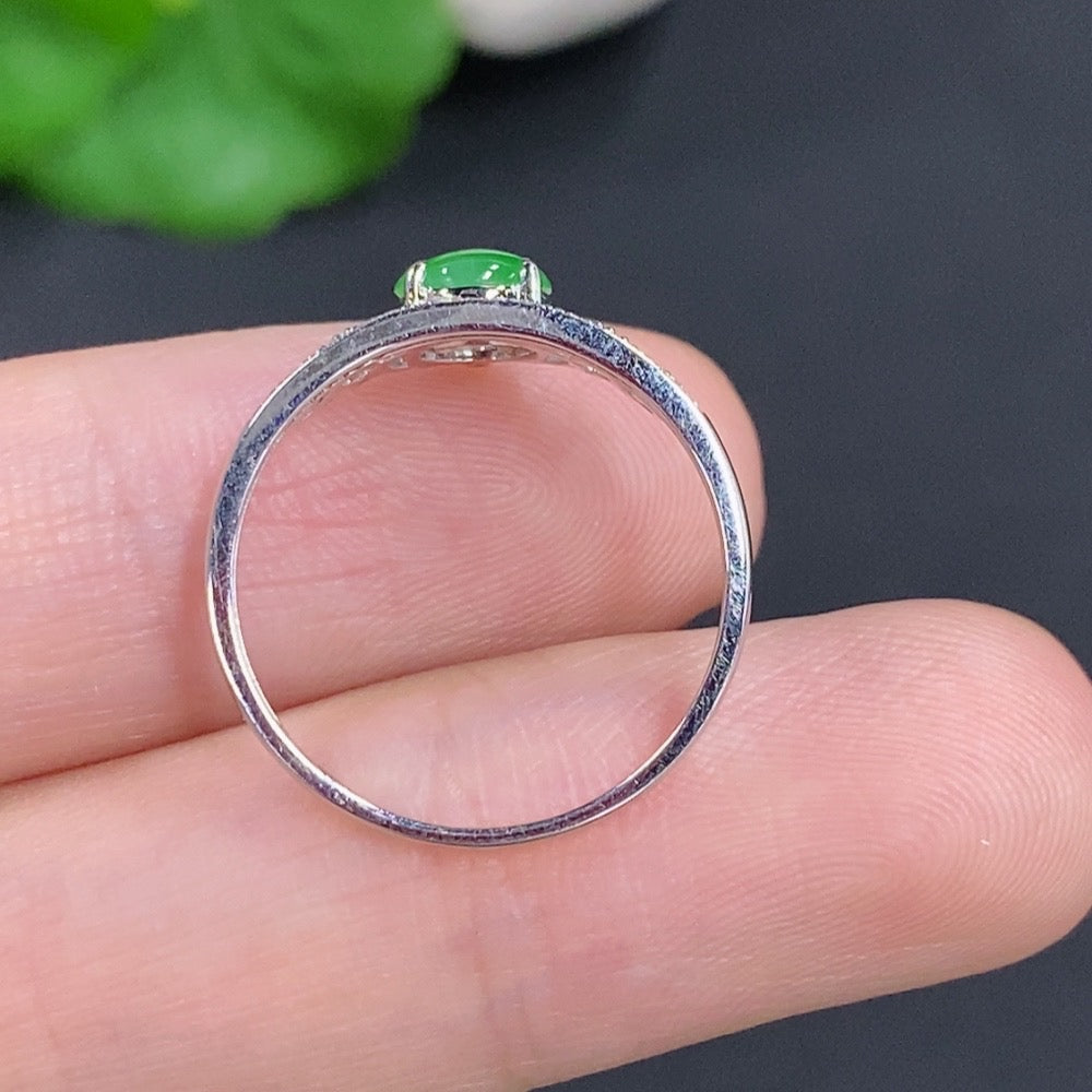 Jadeite cabochon ring with diamond accents in 18k gold, size 15, from HKHQ, showcasing the smooth, polished jade gemstone.