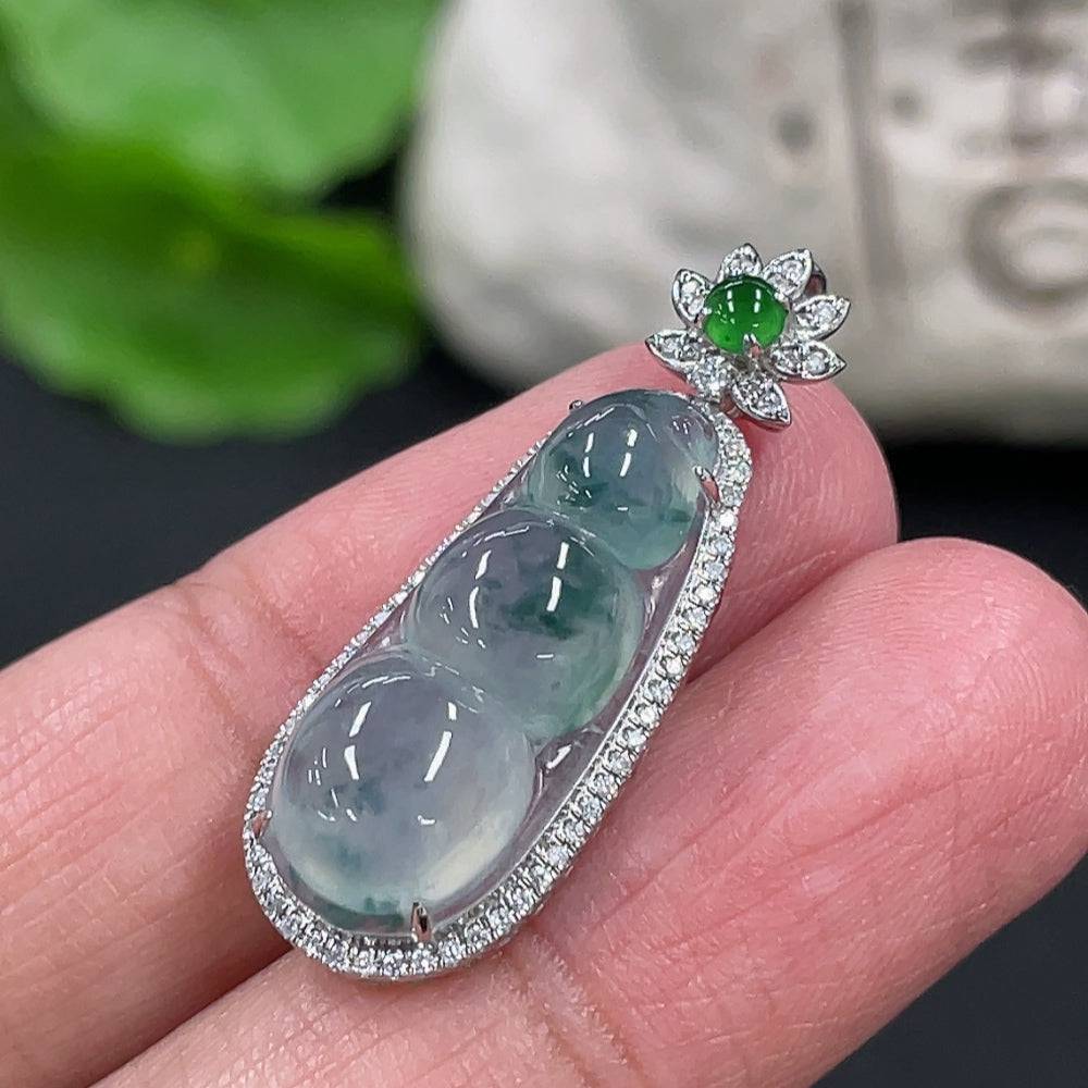 Jadeite lucky bean pendant with 18K gold and diamond accents, crafted by HUILIU HQ, featuring intricate jade details.