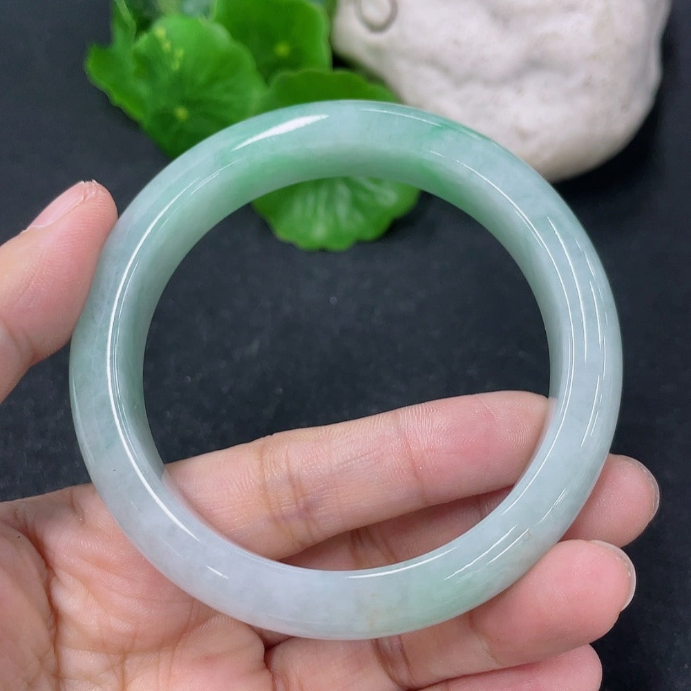 Jadeite round bracelet with a 55.2mm diameter, handcrafted jade jewelry by HKHQ featuring smooth, polished green jade beads.