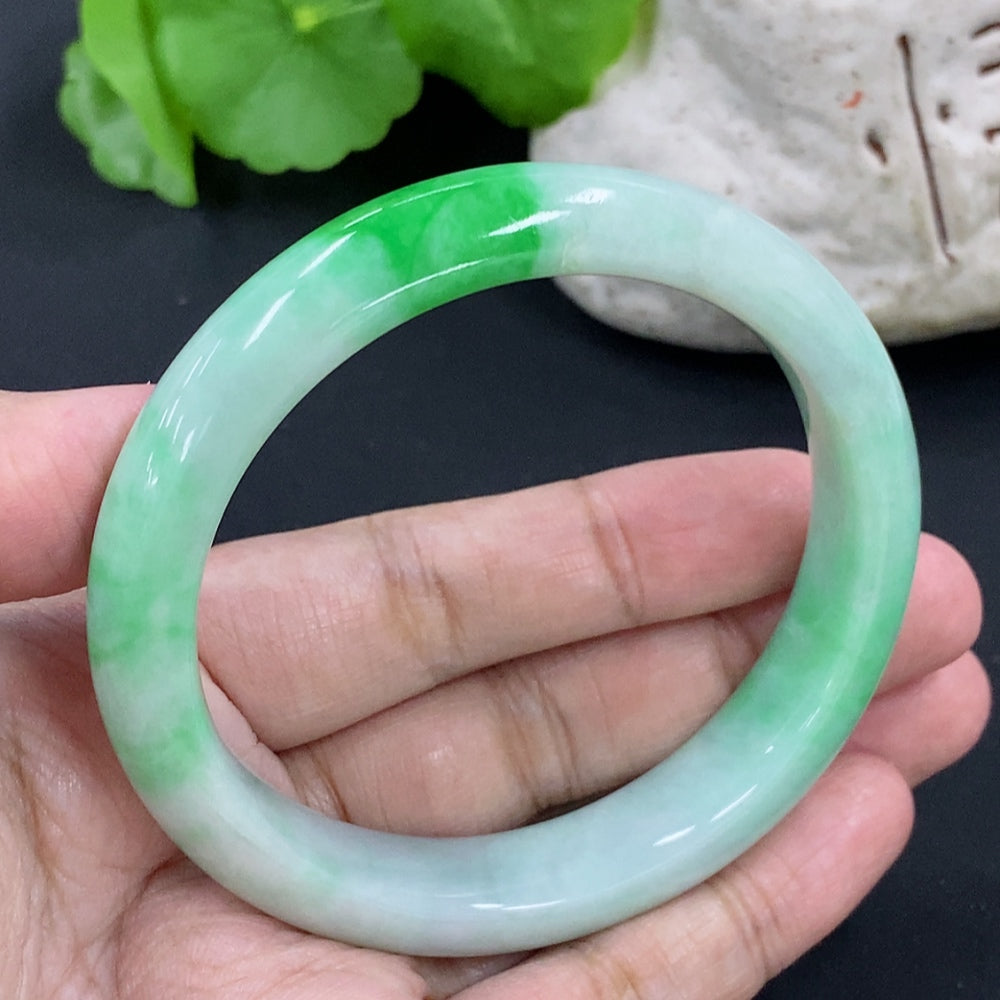 Jadeite round bracelet with a total weight of 54.97g, size 56.9, featuring smooth jadeite beads on a jewelry bracelet.