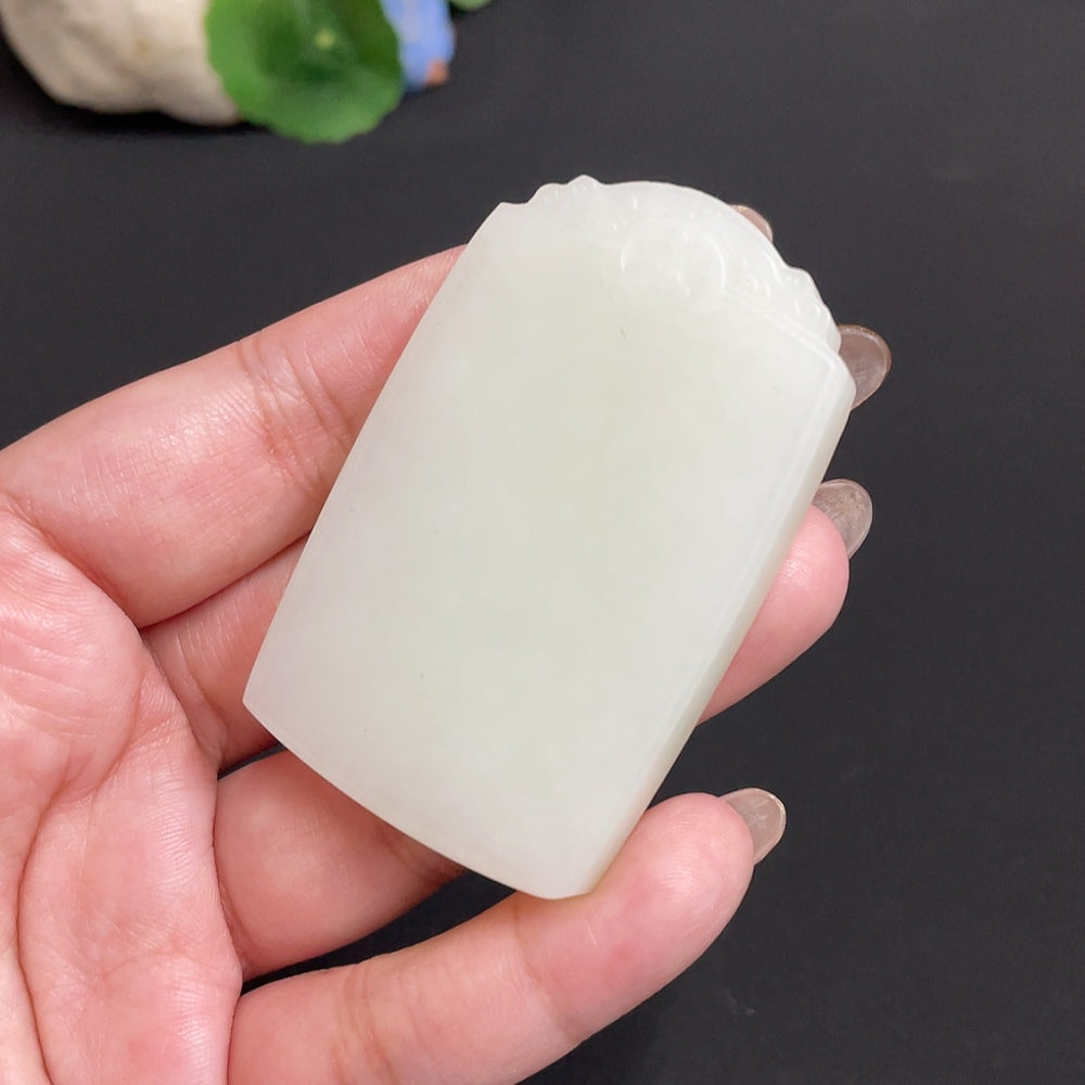 Huiliu certified Hetian jade pendant, plain jade jewelry piece showcasing smooth, polished surface and elegant natural color.
