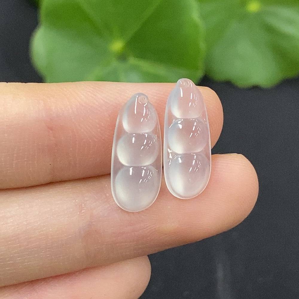 Jadeite auspicious bean inlay piece from HUILIU HQ, showcasing intricate jade craftsmanship and smooth polished surface.