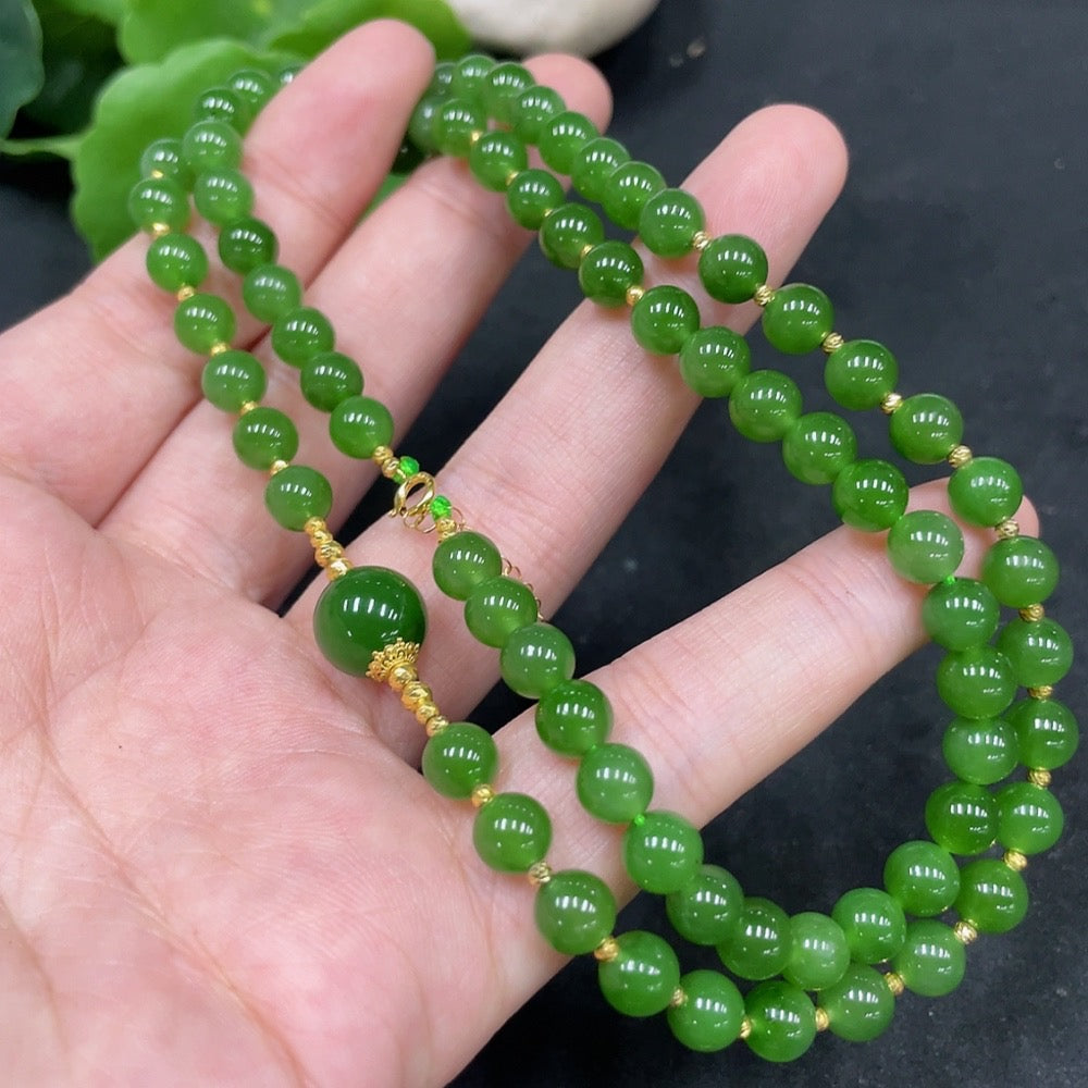 Hetian Jade Jasper bead necklace with 6mm beads, featuring gold content, from HUILIU HQ, showcasing the necklace's elegant design.