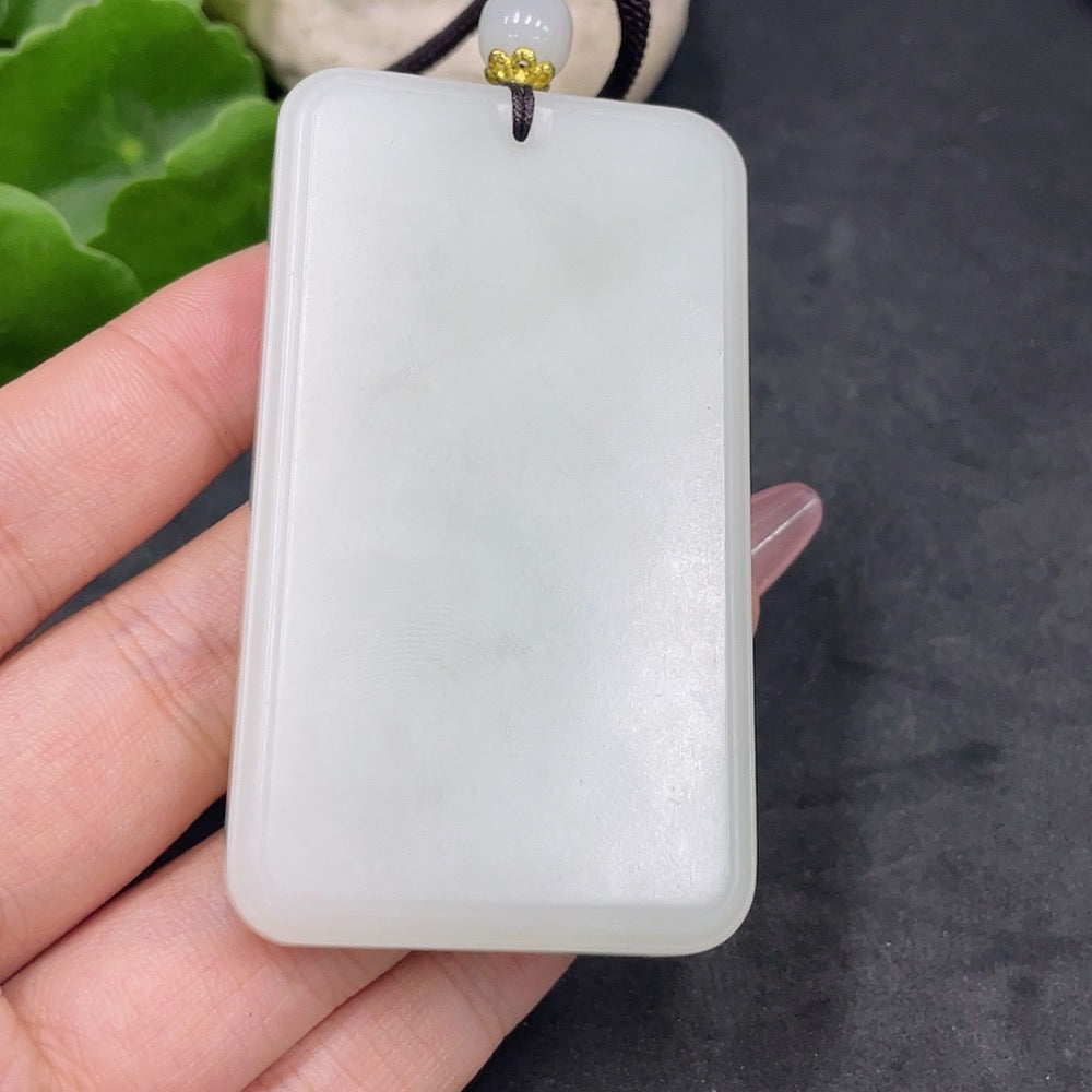 Huiliu certified Hetian jade plain pendant showcasing smooth, polished jade surface with subtle natural stone variations.