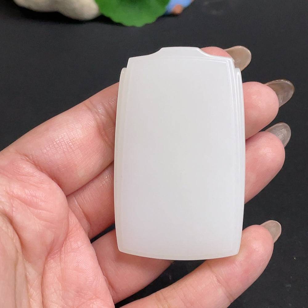Huiliu HQ Hetian Jade pendant featuring a plain, smooth jade stone with a polished surface, showcasing natural green hues.