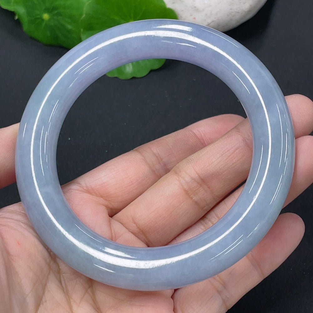 Jadeite round bangle with a polished finish, approximately 72.67g, size 56, by HUILIU HQ, showcasing smooth jade craftsmanship.