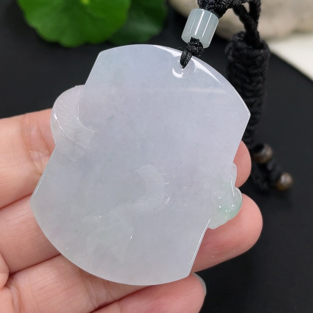 Jadeite dragon pendant with intricate carved design, weighs approximately 34.52g, displayed with a rope, by HUILIU HQ.