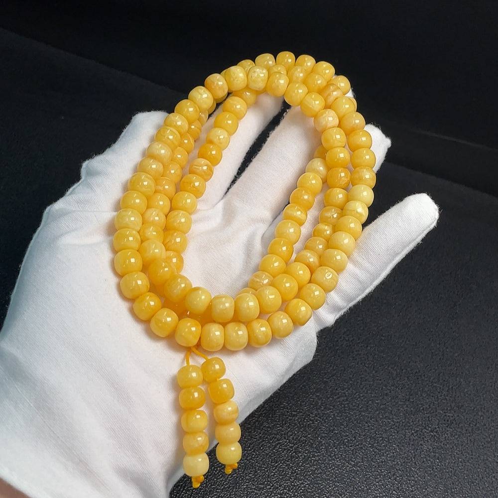 Amber Beeswax Bead Necklace by HUILIU HQ with 8.8mm beads, weighs 45.64g, featuring warm amber-colored beeswax beads.