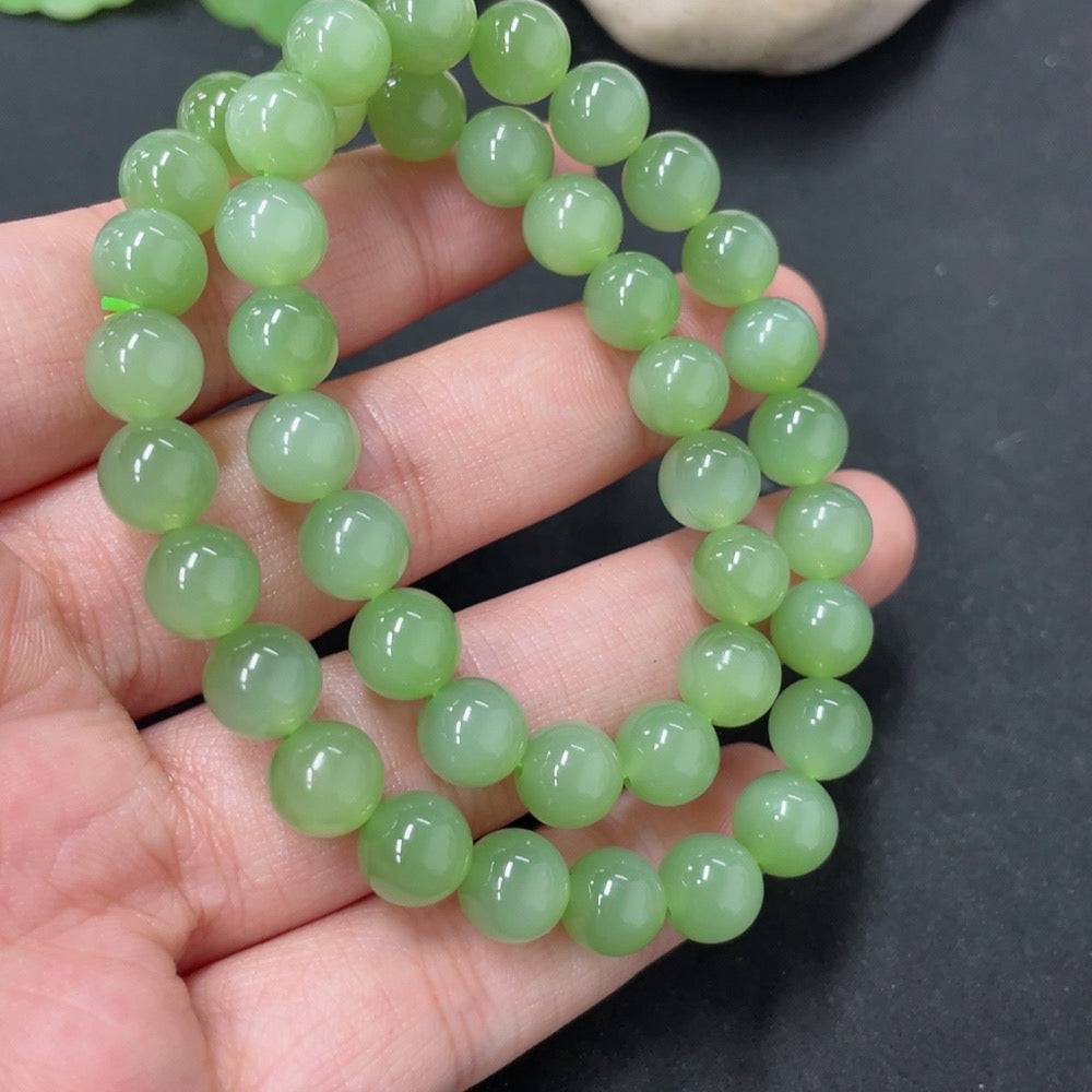 HUILIU HQ Hetian jade bead necklace with 7.6mm beads, total weight 33.6g, featuring smooth green jade beads on a string.
