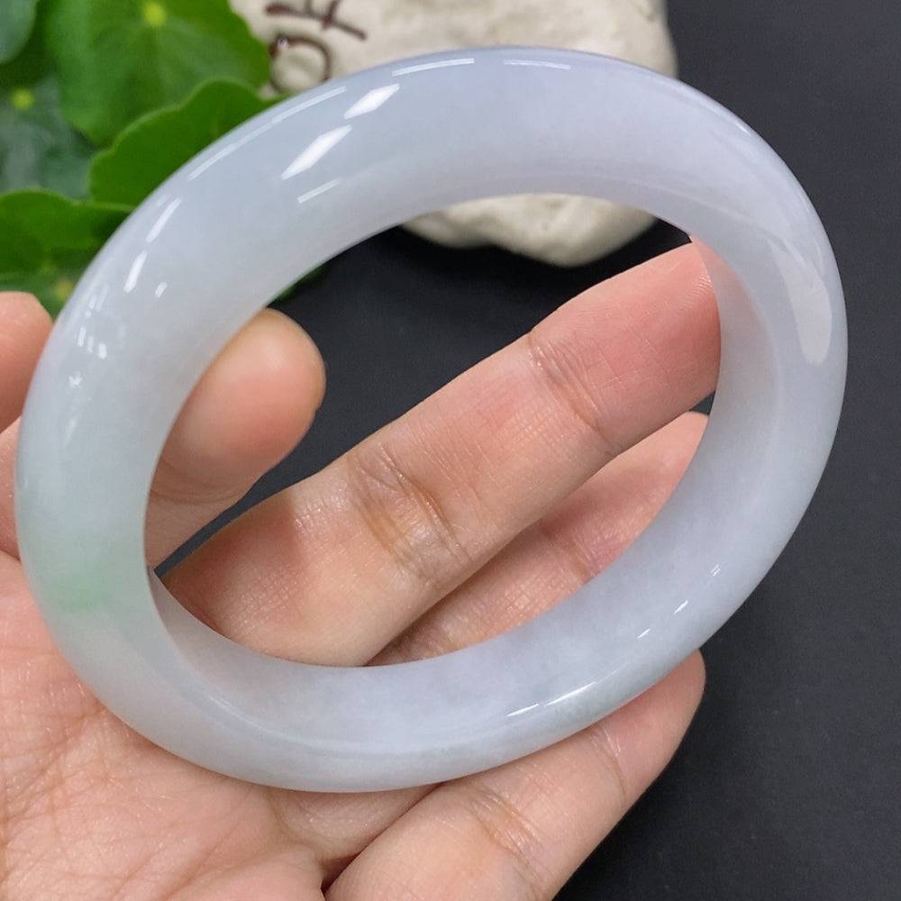 HUILIU HQ jadeite round bangle in size 56, featuring a smooth polished surface and a total weight of approximately 63.1 grams.