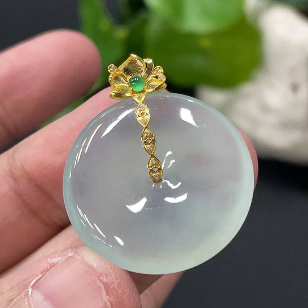Jadeite safety pendant with 18K gold bail and diamond accents, weighing approximately 6.87g, from HUILIU HQ.