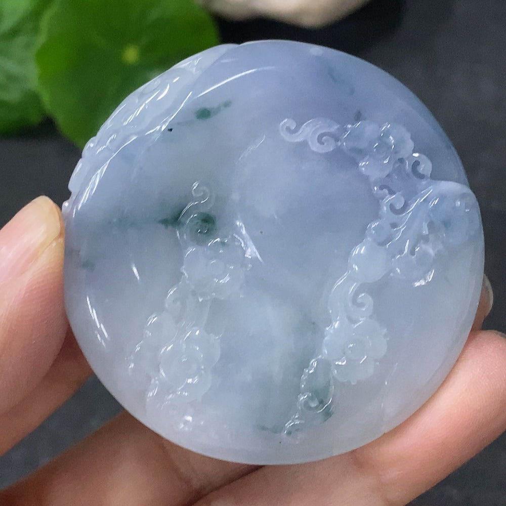 Jadeite phoenix pendant with intricate carvings, weighing approximately 49.9g, crafted by HUILIU HQ, showcasing detailed jade craftsmanship.