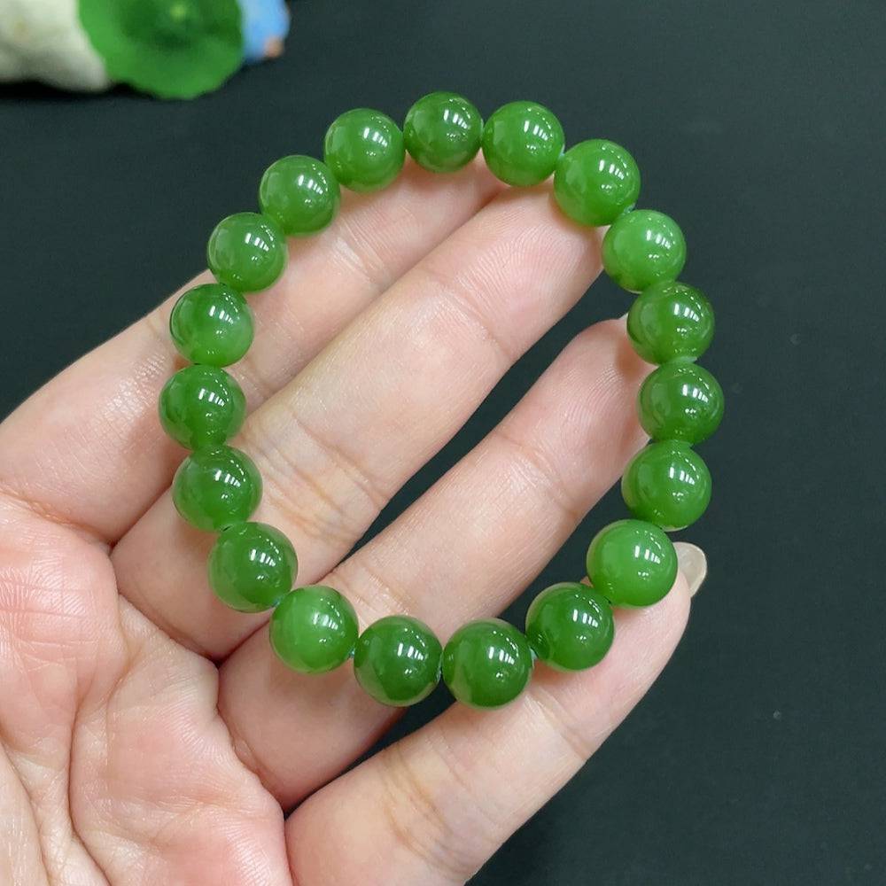 Hetian Jade Jasper bracelet with 9.3mm beads, weighing 24.1g, featuring smooth, polished green and brown jade stones.