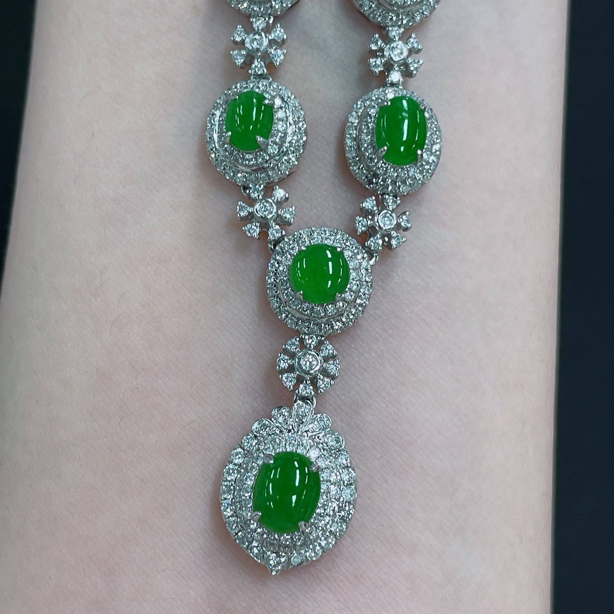 HUILIU HQ Jadeite necklace set with diamonds, featuring a polished jade pendant and matching earrings, elegant and luxurious jewelry.