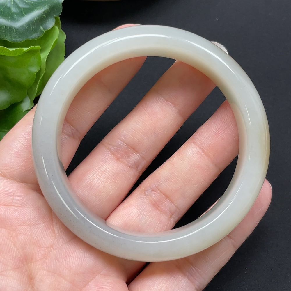 Smooth Hetian Jade round bangle bracelet from HKHQ, size 53.9, with a weight of 54.46g, showcasing elegant jade craftsmanship.