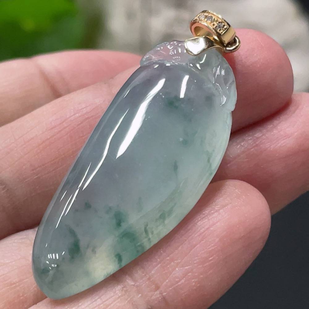 Huiliu Jadeite auspicious melon pendant with diamond-accent clasp, crafted from green jade, featuring detailed carved design.
