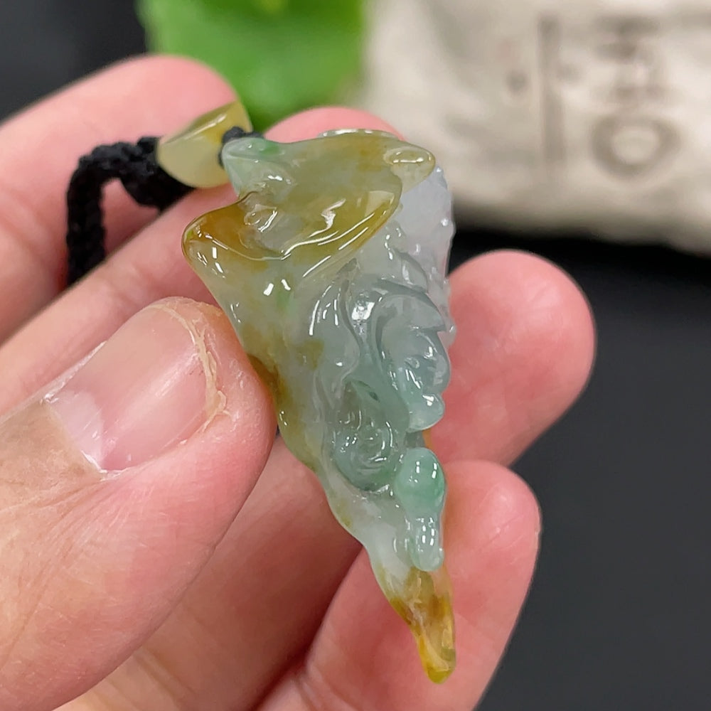 HUILIU HQ jadeite dragon pendant, detailed green jade with intricate dragon design, weighs approximately 16.38g.