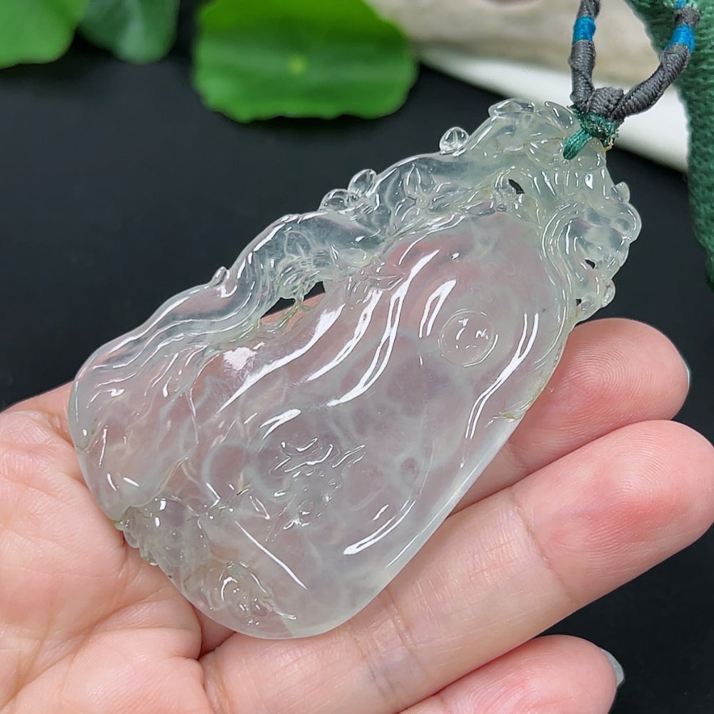 Jadeite pendant featuring Guanyin figure on cord, approximately 27.4g, crafted by HKHQ, with detailed jade carving and smooth finish.