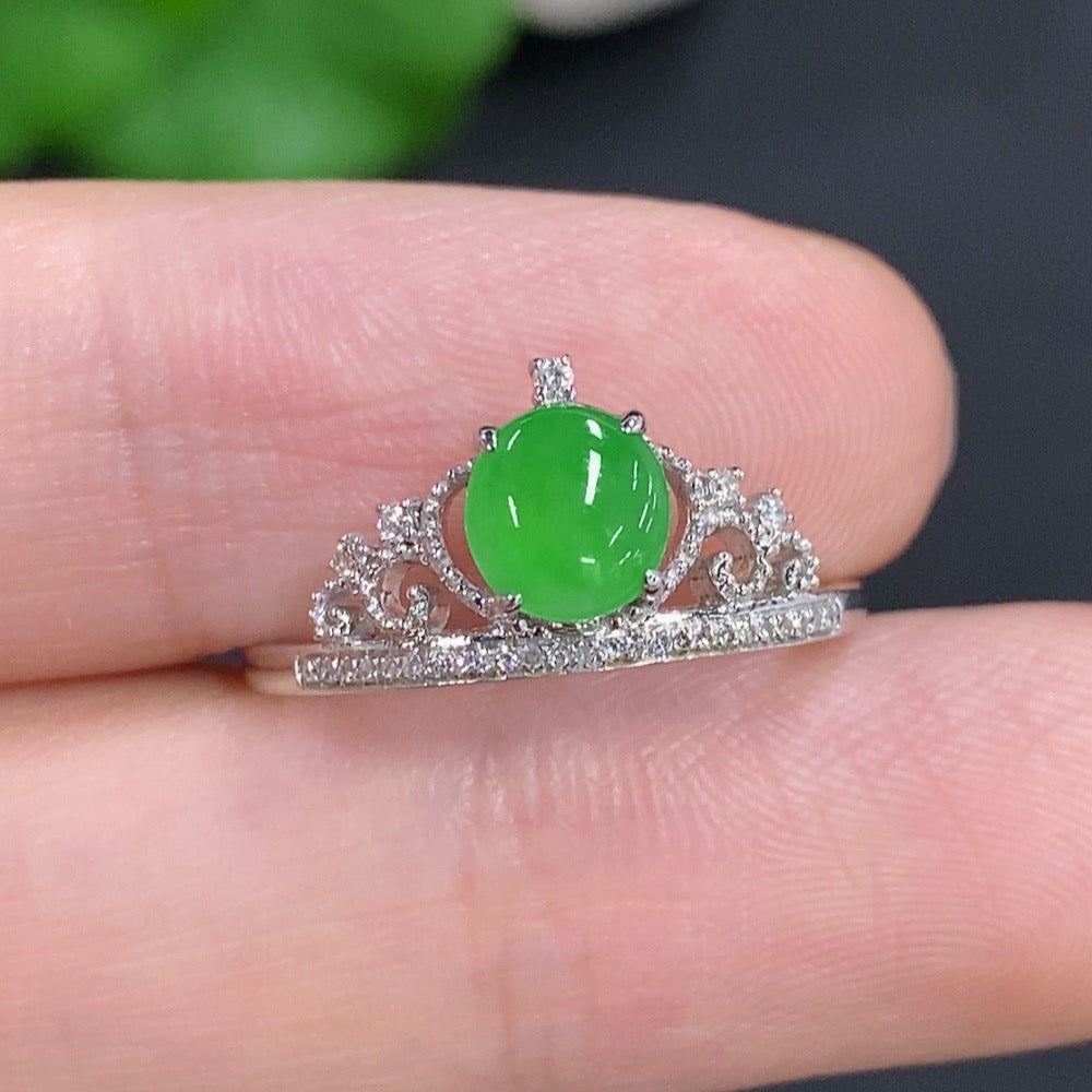 Jadeite cabochon ring with diamond accents in 18k gold, size 15, featuring a polished green jade gemstone and delicate gold setting.