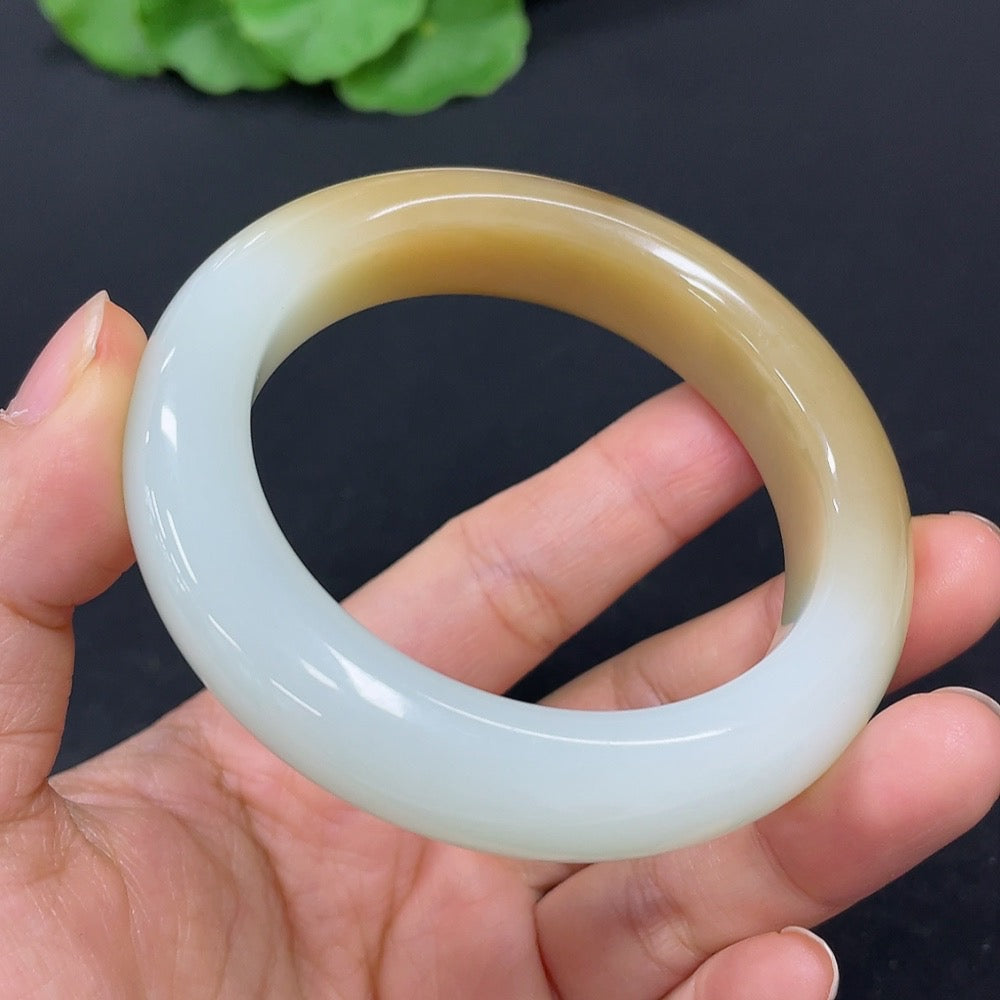 Hong Kong HKHQ Hetian Jade round bangle, size 51.3, weighing 60.1g, showcasing smooth, polished green jade bracelet.