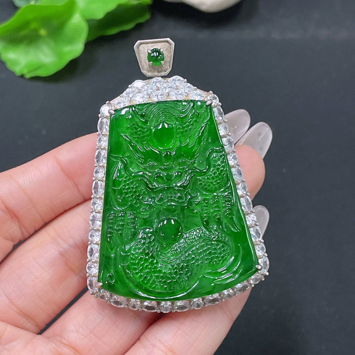 Jadeite dragon pendant plaque by HUILIU HQ, non-gold, weighing approximately 26.55g, featuring intricate carved dragon design.
