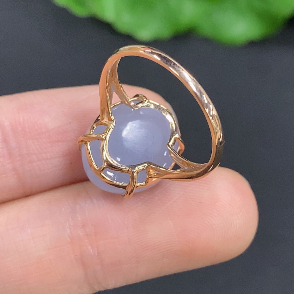 Huiliu jadeite cabochon ring with diamond accents, showcasing smooth green jade and sparkling gemstones on a silver band.