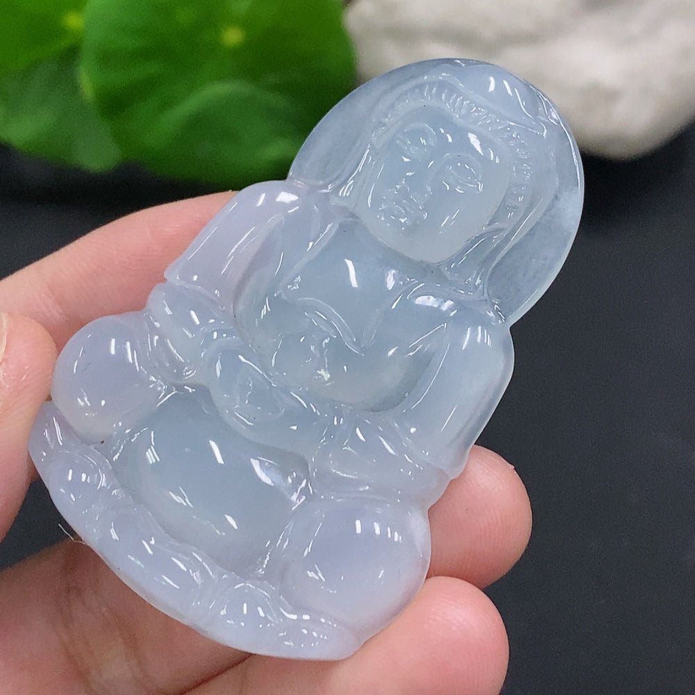 Huiliu Jadeite Guanyin pendant with intricate carving, certified jade jewelry, showcasing detailed craftsmanship and spiritual symbolism.