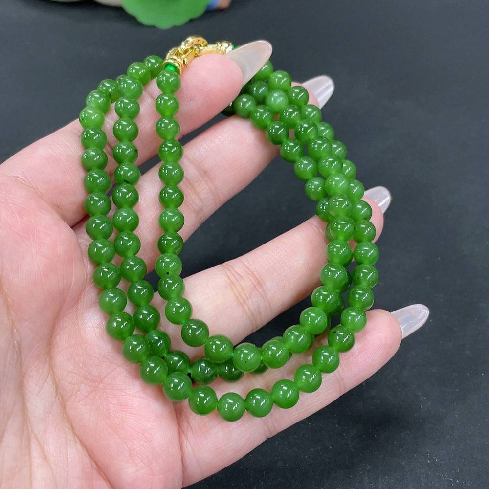 Hetian Jade bead necklace with 5.9mm beads, non-gold, featuring smooth, polished jade stones, weighs approximately 37.3 grams.