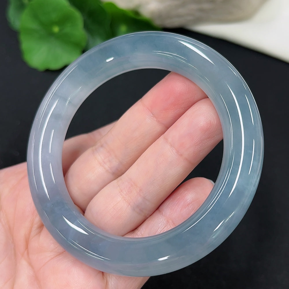 HKHQ Jadeite round bangle, size 55.2, 71.6g, showcasing smooth green jade surface and polished finish.