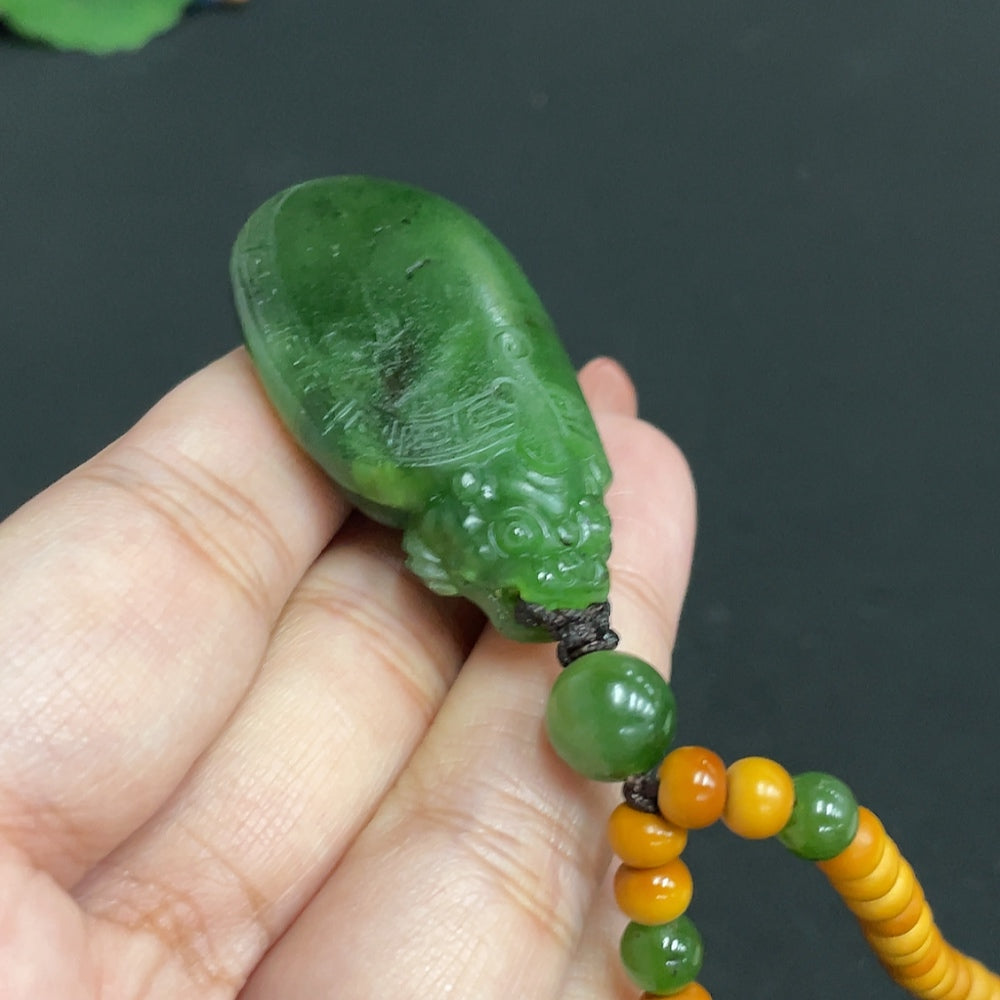 Hetian Jade Jasper pendant featuring a dragon turtle design, weighing approximately 39.5g with chain, by HUILIU HQ.