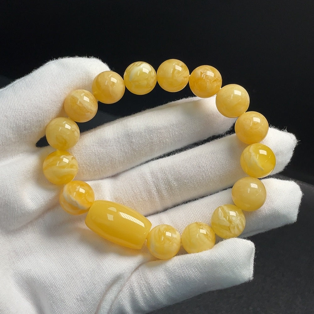 Huiliu Certified Amber beeswax bracelet with about 12.1mm beads, natural amber jewelry featuring warm, golden tones.
