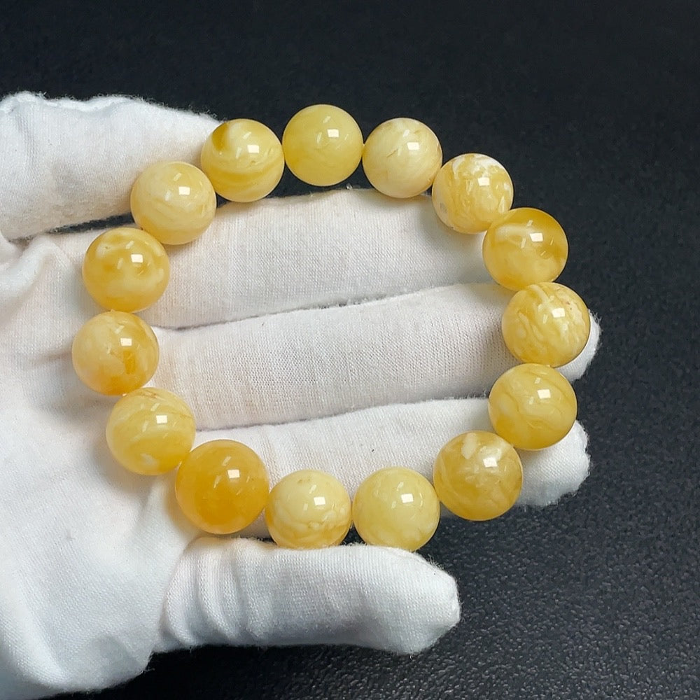 Amber Beeswax Bracelet by HUILIU HQ, 14.2mm beads, total weight 24.33g, natural amber jewelry on a white background.