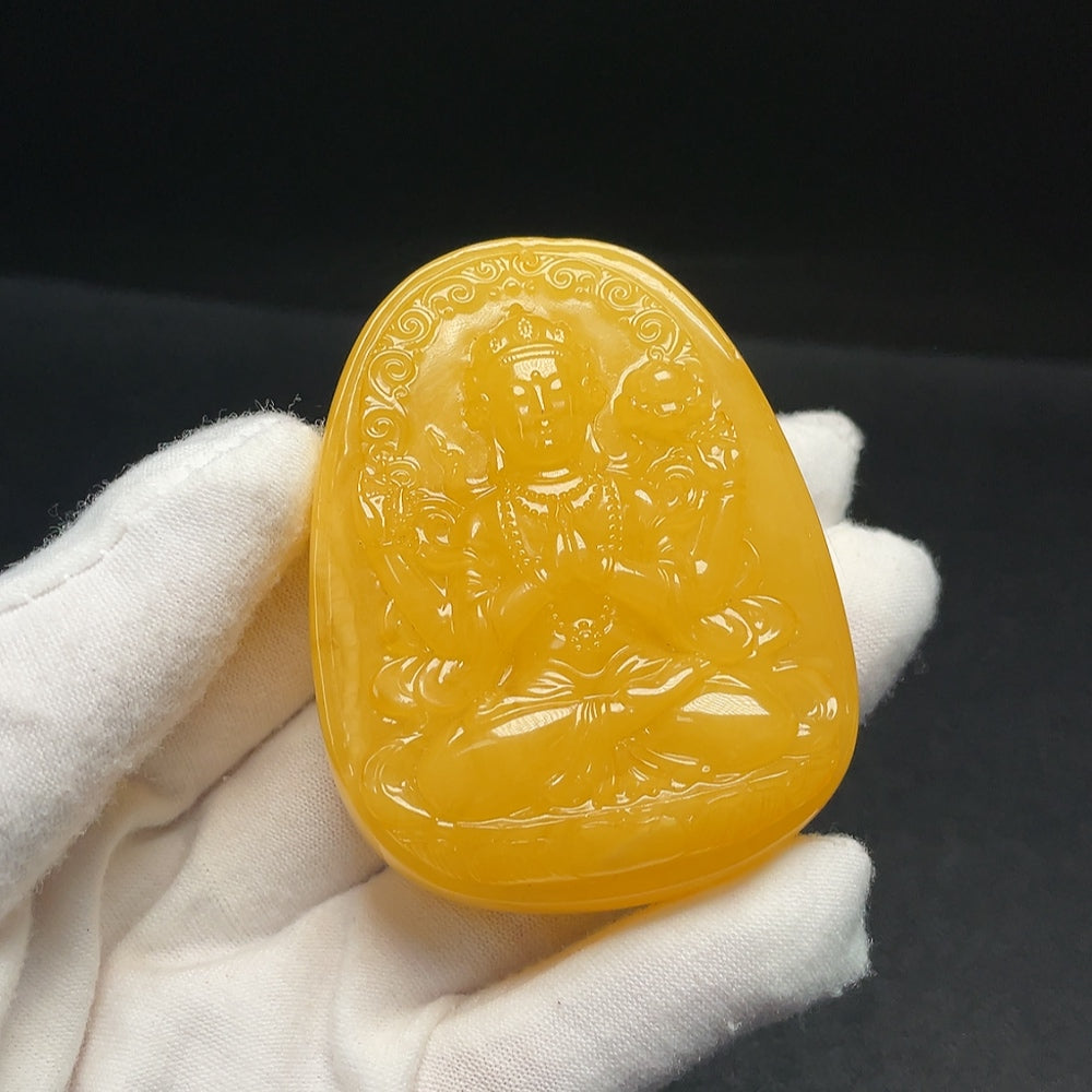 Huiliu HQ amber beeswax pendant with partial repairs visible, showcasing natural amber and craftsmanship.