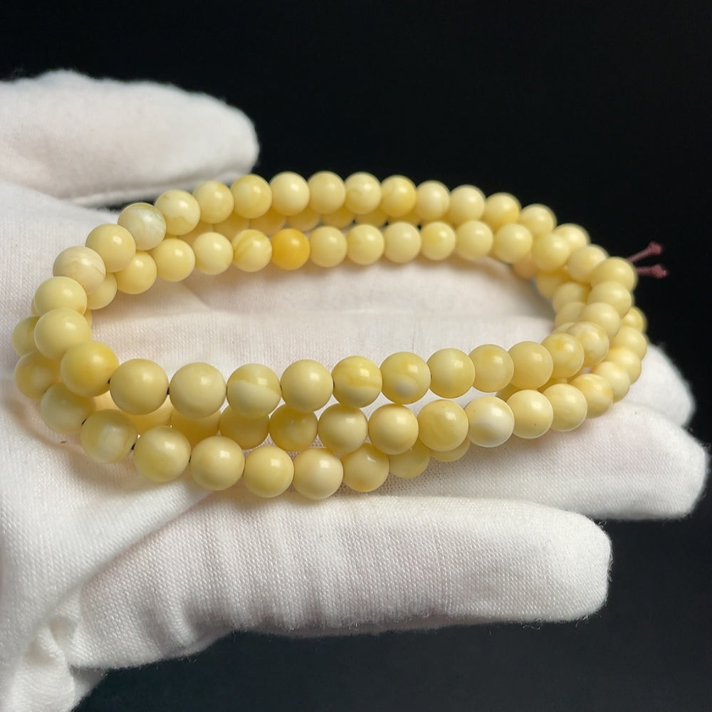 Amber Honey Bead Necklace by HUILIU HQ featuring 6.2mm amber beads on a natural jewelry strand.